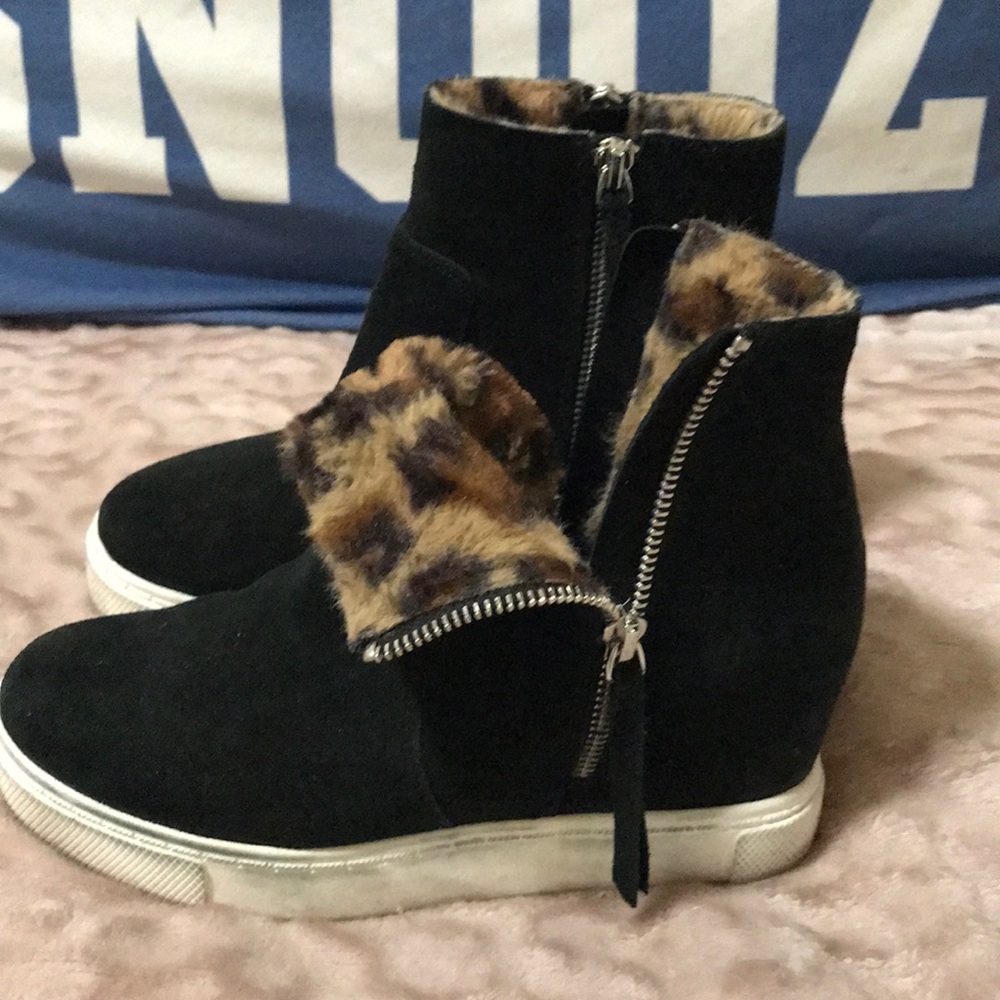Cheetah fur wedges booties.